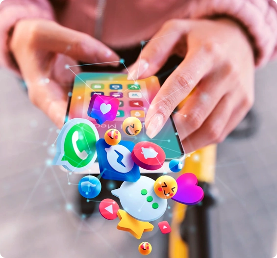 Pessoa usando o celular com ícones de redes sociais saltando da tela